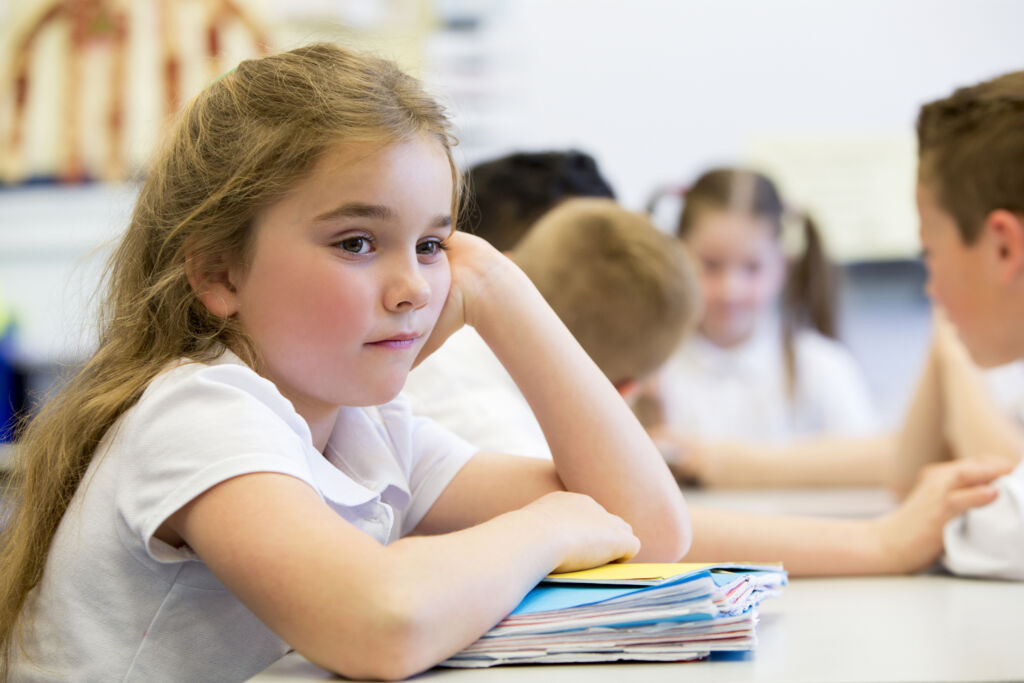 Girl struggling in class