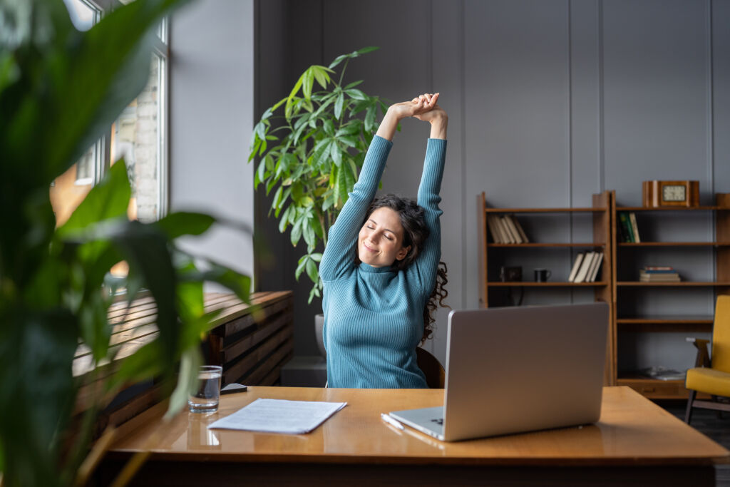 bigstock Happy Businesswoman Warming Up 447690277
