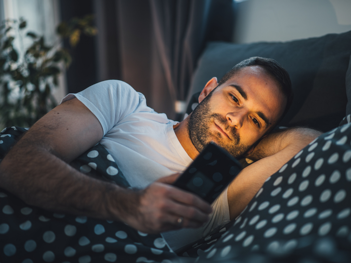 Man online gambling problem in bed